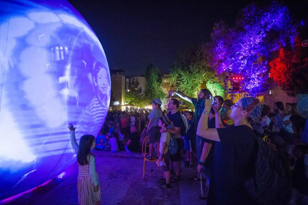 A theater of light, shadows, and video take over Discovery Green. (Courtesy Lucion)
