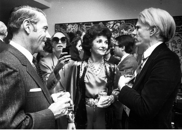 George Schrader, Patsy Nasher, Andy Warhol, at a reception in the artist's honor at the Nasher home, 1979. The Nashers commissioned Warhol to paint a portrait of Patsy, now in the collection of the Nasher Museum of Art, Duke University. (Courtesy exposureguide.com) 