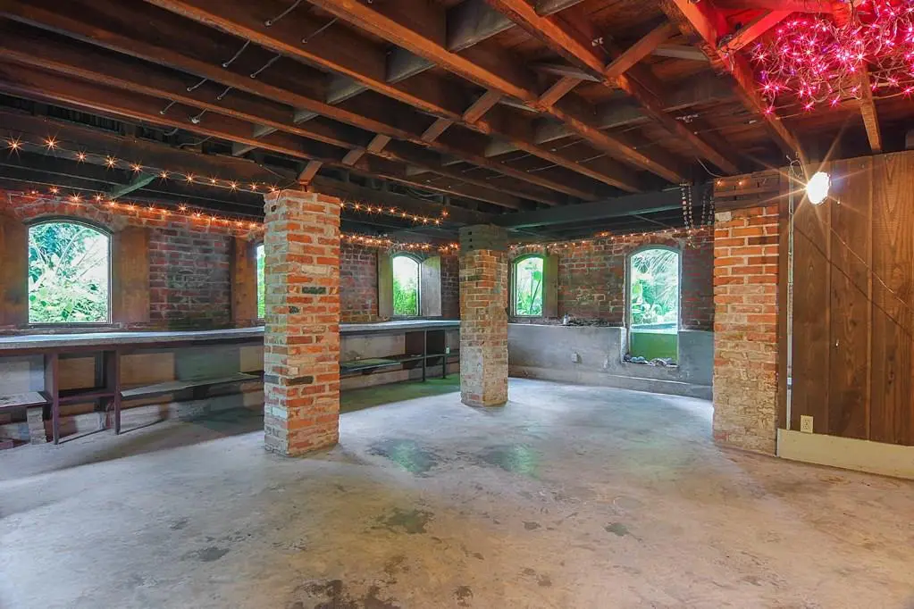 The built-out basement offers a view of the koi pond and the gardens. 