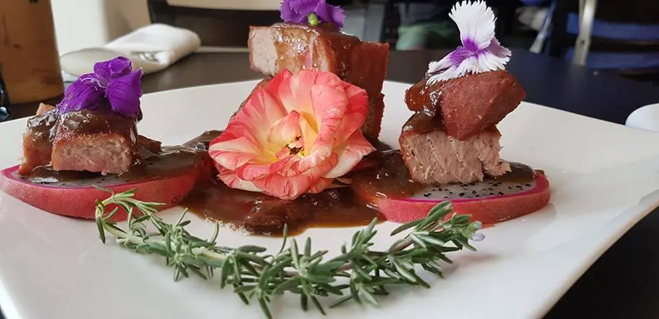 Any Ugly Delicious-approved cuisine is worth a try, like this dish at Kau Ba Saigon. 