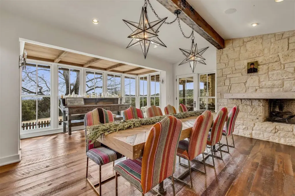 The dining area features pine floors. 