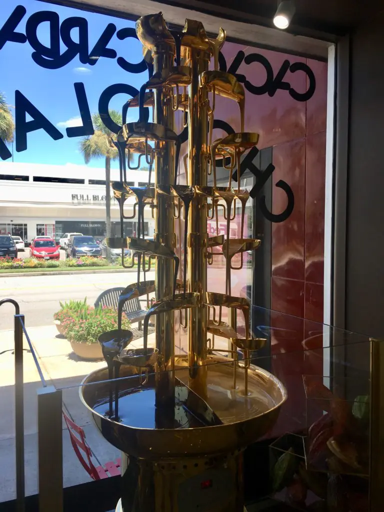 The gold-plated, 5-foot chocolate fountain drips two different types of sweet goodness. 