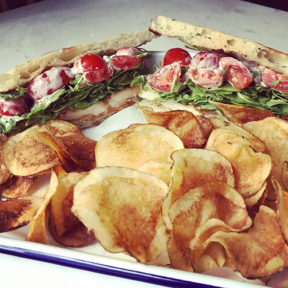 Pizza Motus isn't all about pies — take this rosemary-brined fried chicken panini. 