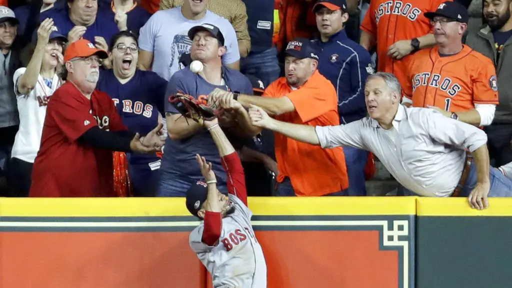 Mookie Betts went into the stands and somehow fan interference was called, taking a home run away from the Astros.