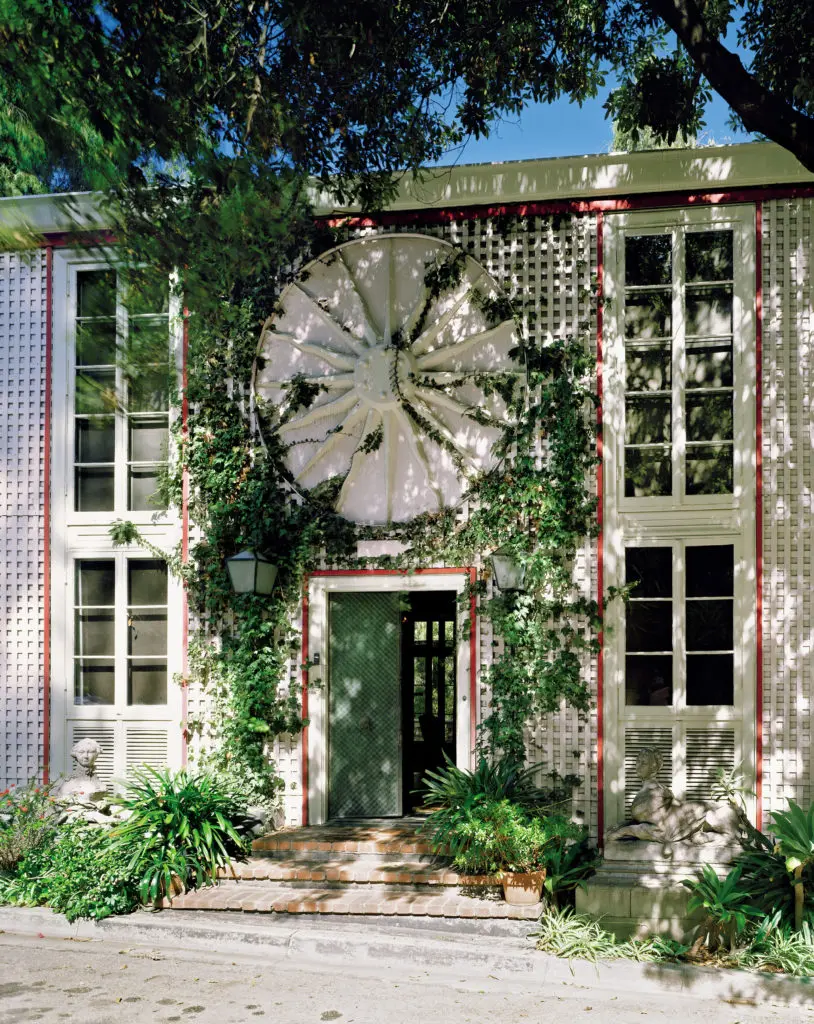 Dawnridge exterior in 1975 with walls covered in pink lattice with coral trim. 