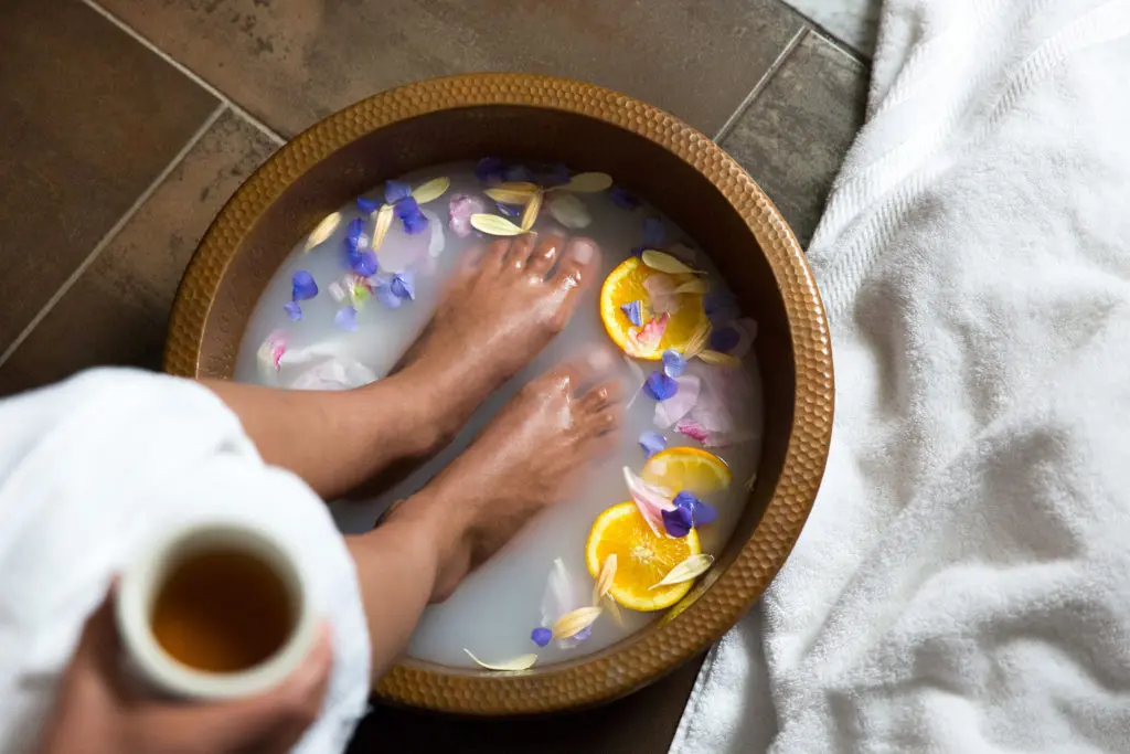 All services at Hiatus begin with a water foot-cleaning ritual.  (Photo by Molly Culver )