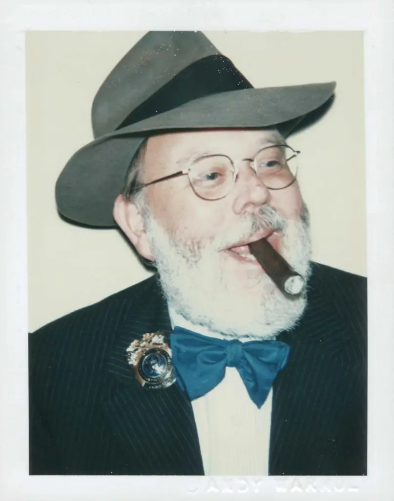 Andy Warhol's Polaroid portrait of his dapper running buddy, art critic and cultural influencer, 
Henry Geldzahler, 1979 (Courtesy Christie's)