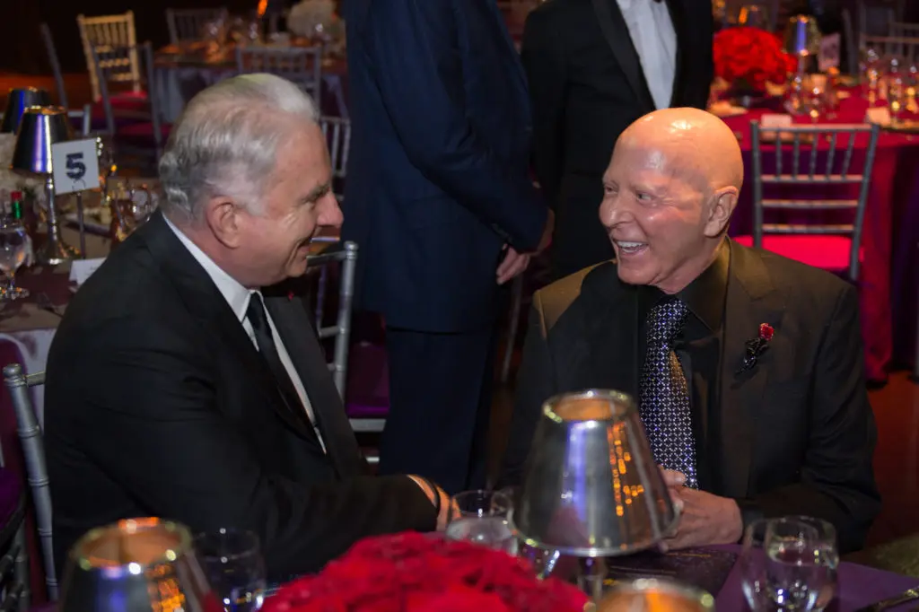 Mark Wallace, Lester Smith at the Legacy of Motown record evening of $83 million.