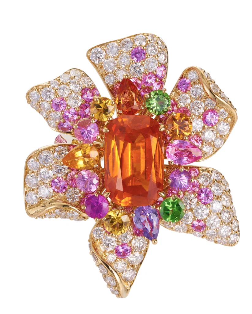Starburst ring with centre Mandarin garnet surrounded by myriad of gemstones and diamonds in 18 karat yellow gold