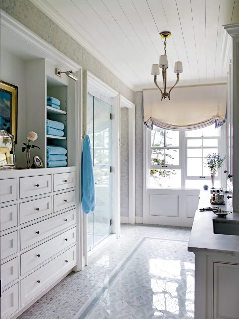 Bright and full of light, the master bedroom and bath has a completely different aesthetic from the rest of the house. A project from Suzanne Kasler: Sophisticated Simplicity. Photo by William Waldron.