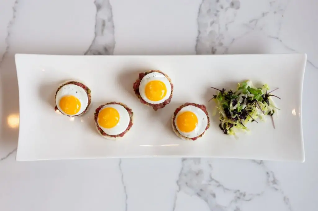 BIsou offers shareables like these Wagyu tartare bites. 