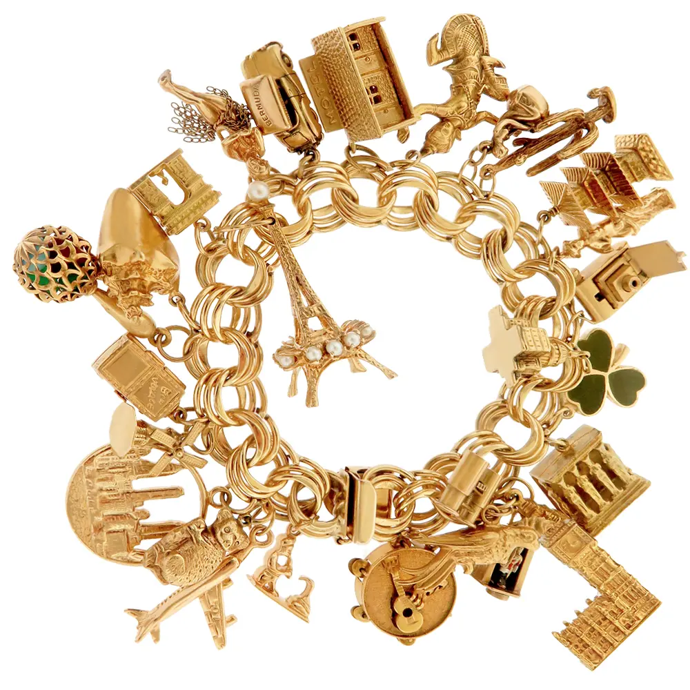 Travel charms, vintage and new, on a classic triple link bracelet 
