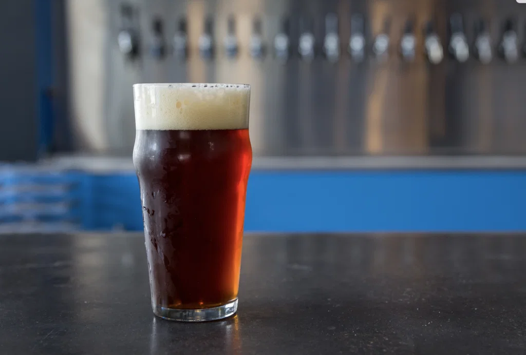 Holler's Houston Triple Craft is a smoked coffee Marzen brewed in collaboration with Greenway Coffee and Feges BBQ. 