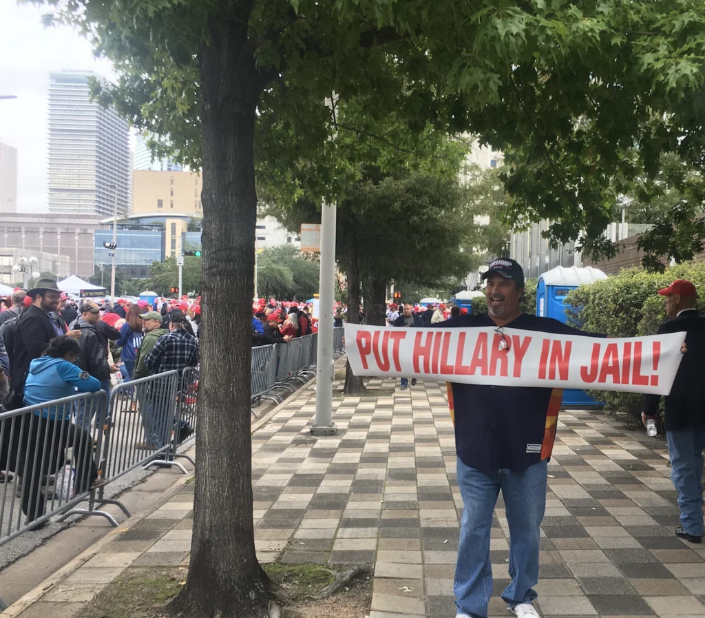 Part of the crowd chanted "Lock her Up!" when they saw this banner. 