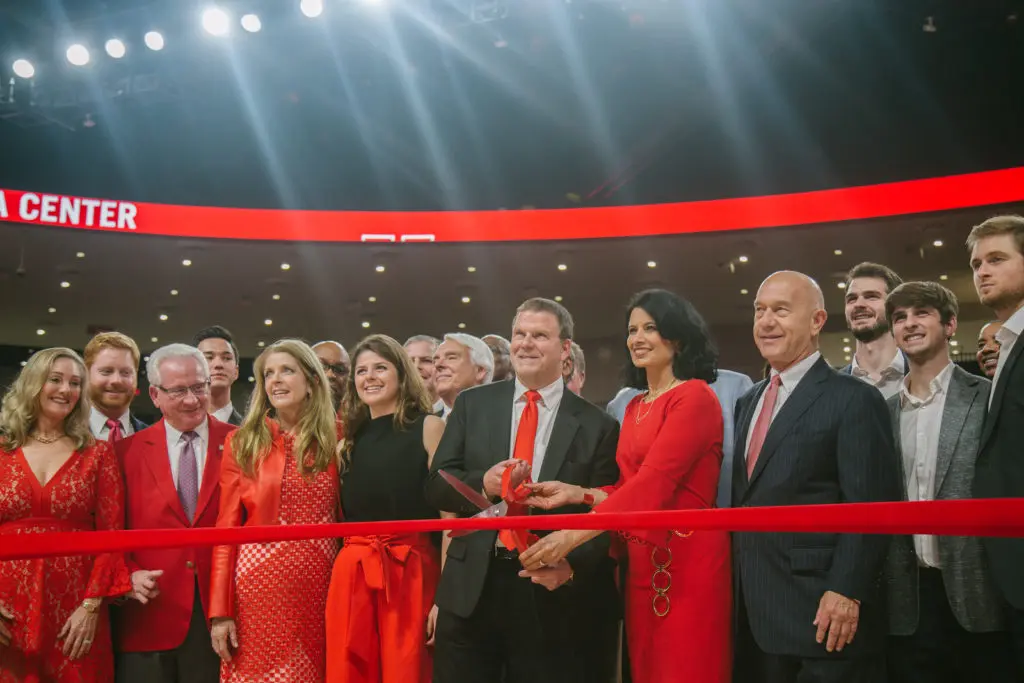 Tilman Fertitta brought an army with him on the new Fertitta Center court. (Photo courtesy University of Houston.)