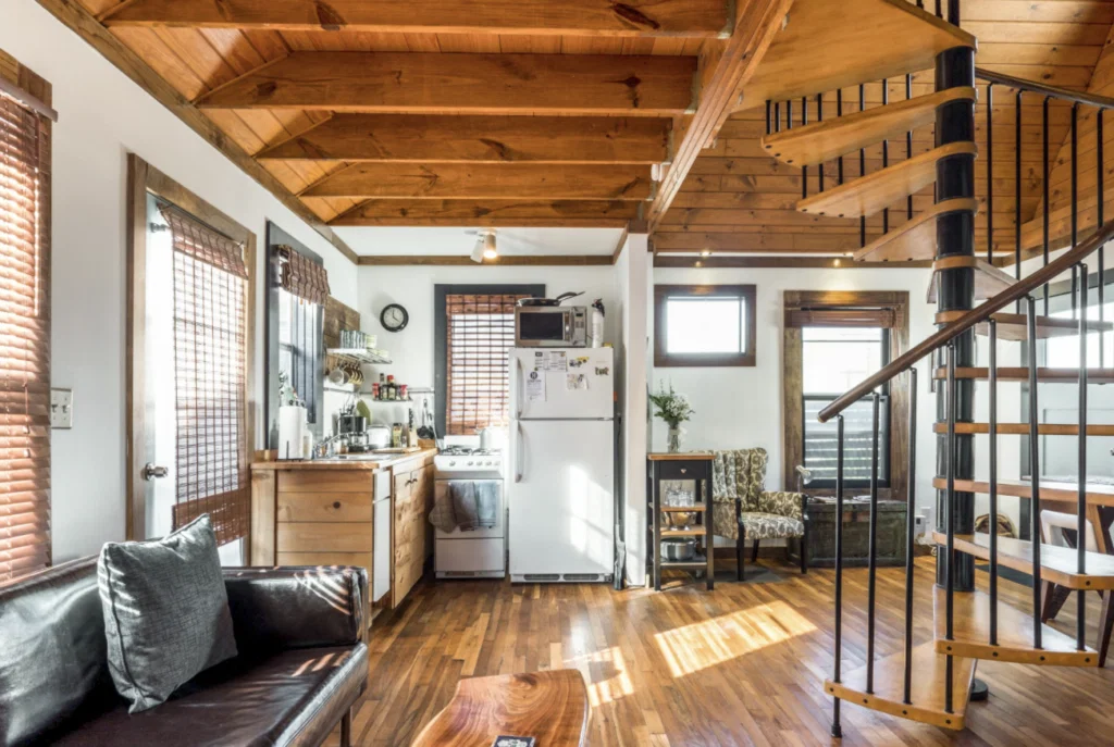 This craftsman cottage features vaulted pine ceilings and custom woodwork. 