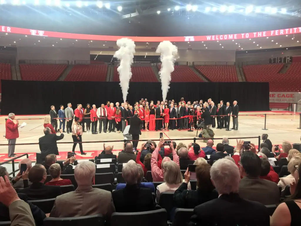 It seemed like Tilman Fertitta wanted to bring the entire crowd onto the court with him. (Photo by Chris Baldwin.)