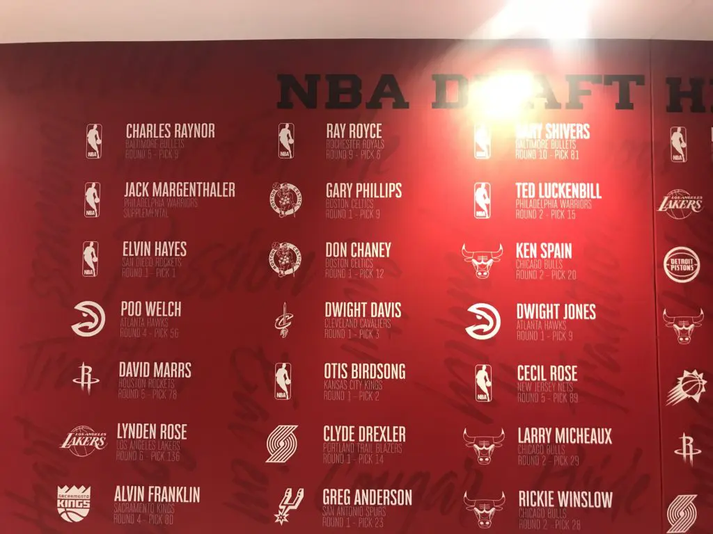 The Fertitta Center includes a red wall dedicated to every Cougar ever drafted by the NBA. (Photo by Chris Baldwin.)