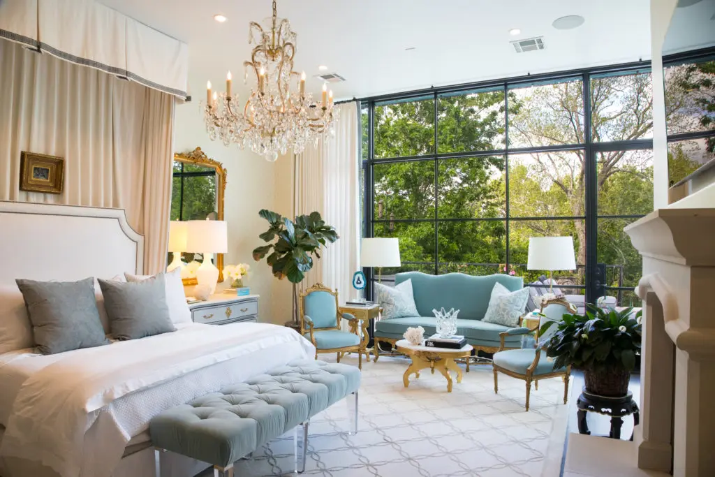 Opulence is the word for the master bedroom that includes a sitting area, fireplace and high ceilings. (Photo by Shannon O'Hara Photography)