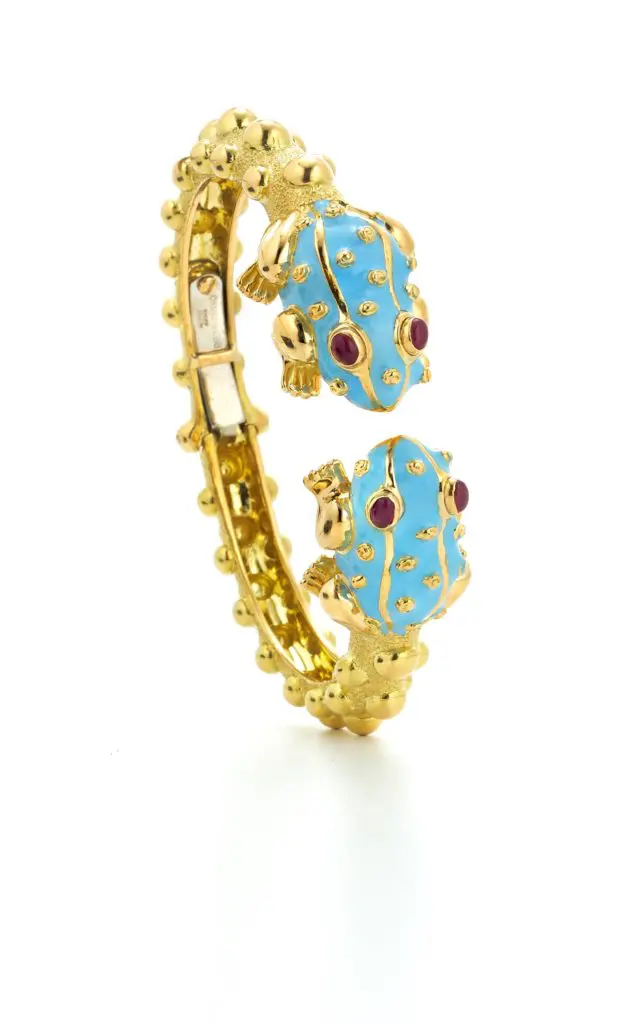 David Webb Baby Frog Bangle in 18K gold with cabochon rubies $19,500, at Tenenbaum Jewelers