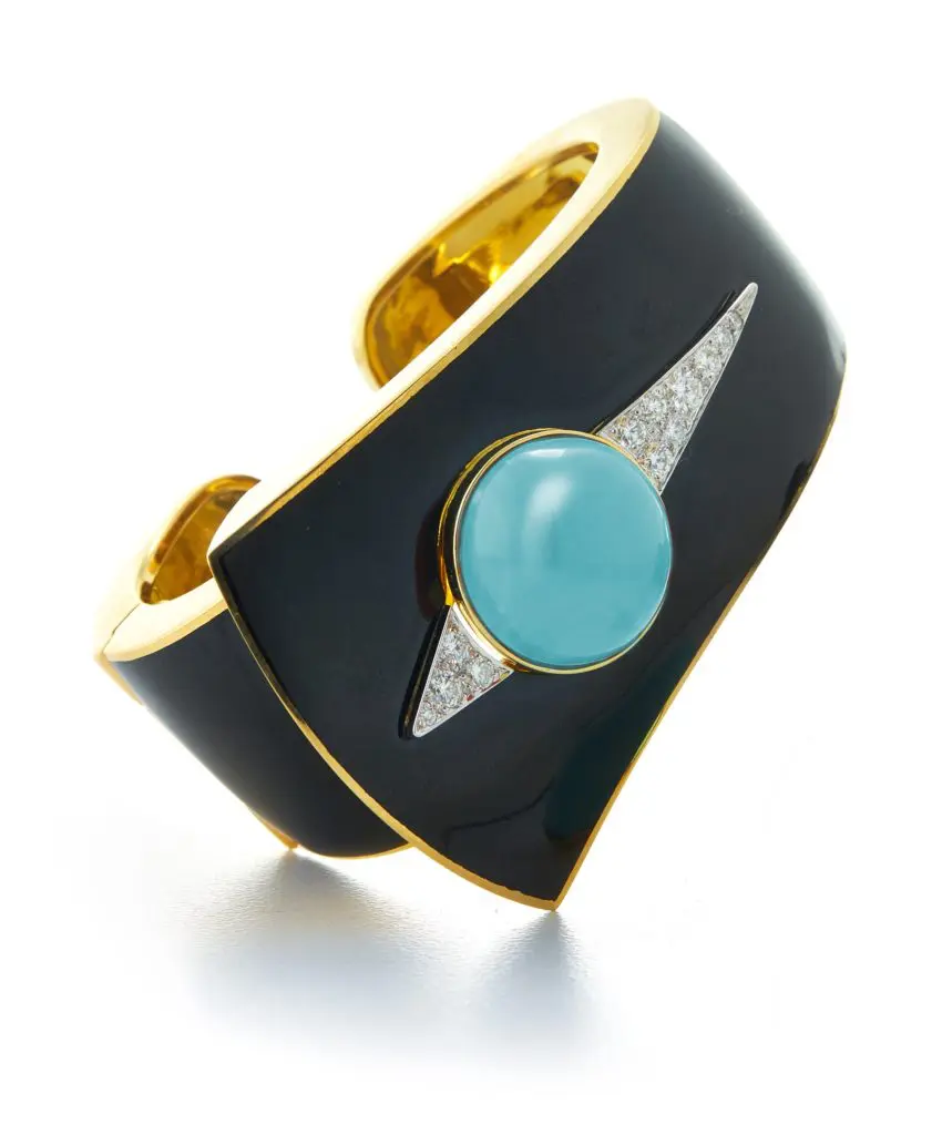 David Webb button cuff in 18k gold and platinum with diamonds and interchangeable cabochon coral and turquoise, $56,000, at Tenenbaum Jewelers