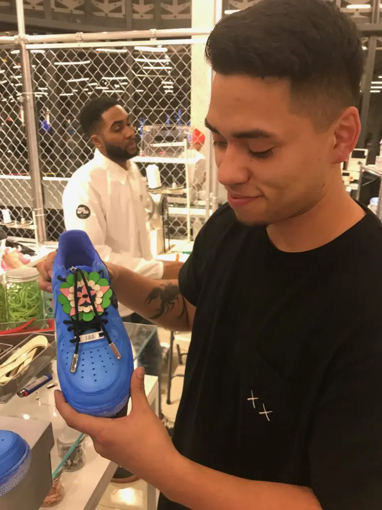 A Nike lab specialist shows off my new kicks.