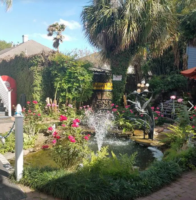 The restaurant is known for its expansive, lush backyard. 