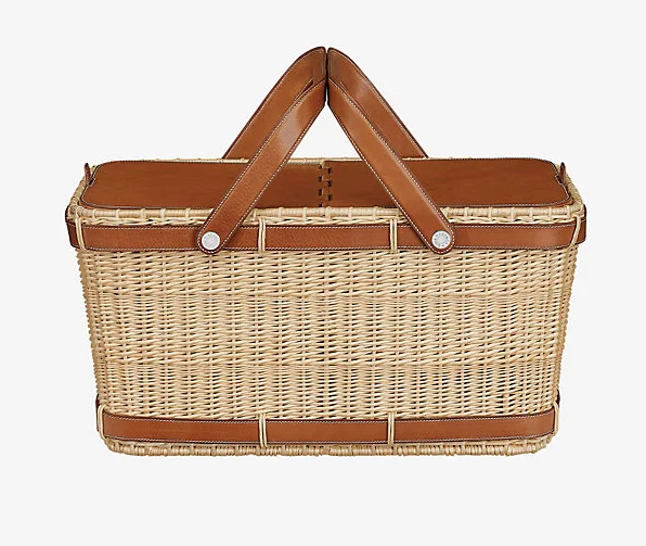 A pretty bow can be placed on this Hermès picnic basket for just the right under the tree presentation.