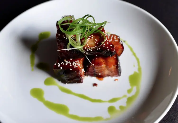 Are you really a Texas foodie if you haven't heard of Killen's cherry-habanero glazed pork belly? 