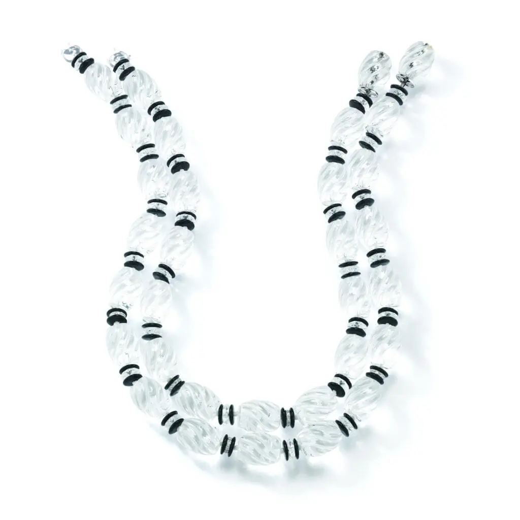 Seaman Schepps Torchon necklaces in 18k white gold with carved rock crystal, black onyz, and diamonds, $4,500, at Tenenbaum Jewelers