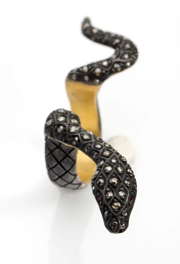 Yossi Harari snake cuff ring in 24K gold with rubies and cognac diamonds, $6,708, at Elizabeth Anthony
