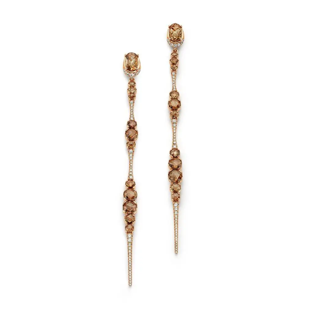 Simplicity and elegance are embodied by this sleek pair of these de Boulle collection chic danglers. The delicate shape is studded with brilliant cut and rose cut fancy colored diamonds in 18K rose gold. The result: subdued style and a strong statement.    (0.48 ctw. round brilliant diamonds and 4.62 ctw. rose cut fancy color diamonds, $21,650)