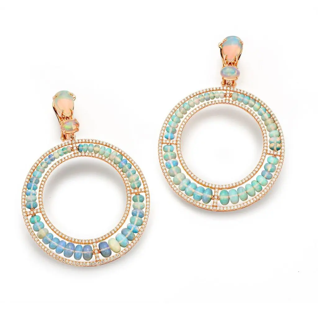 Beaded opals are  arranged in a circular pattern in these earrings, framed by diamonds in 18K rose gold. (25.99 ctw. opal and 2.59 ctw. diamonds, $31,200)
