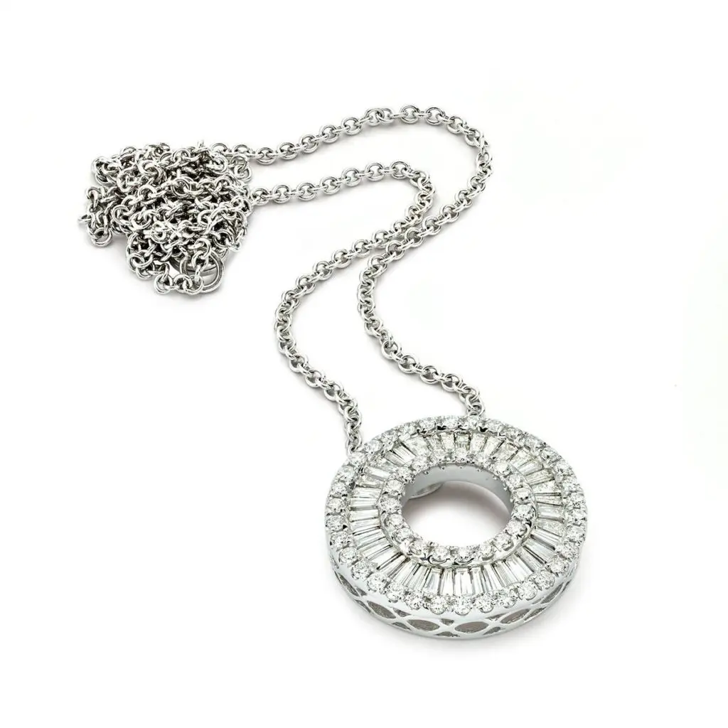 These sparkler pendants with diamonds shine  in 18K white gold. (1.49 ctw. tapered baguette and round brilliant diamonds, $4,150)