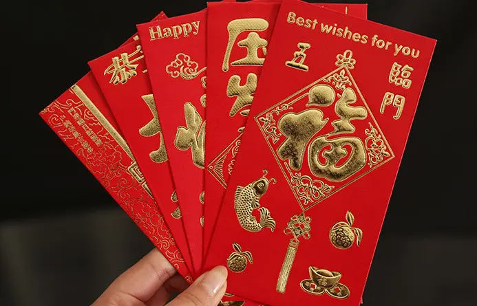 Chinese New Year means red envelopes — and you'll be lucky to get one.