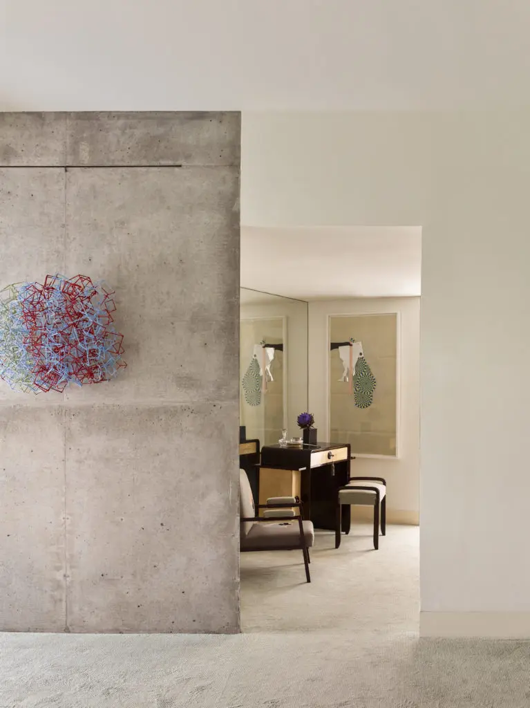 Emily Summers collaborated on a Dallas house designed by architect Antoine Predock. The concrete wall outside the guest bedroom includes a 2000 construction by artist Liz Larner.  (Photo by Nikolas Koenig)