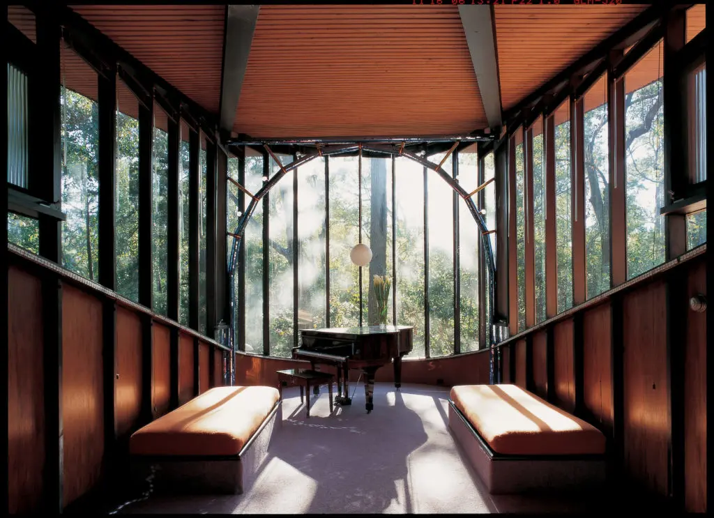 Light rakes into the music room of the Durst-Gee House.