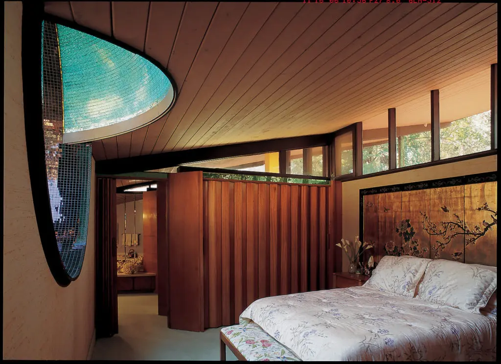 First-floor master bedroom of the Durst-Gee House faces a signature Goff window.