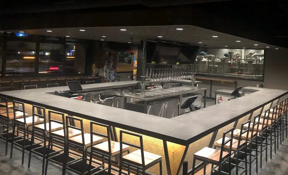 A massive 32-tap 30-seat island bar greets you when you first walk into Deep Ellum Funkytown Fermatorium.