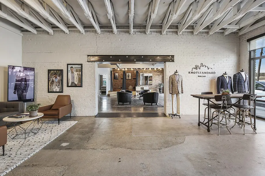 The Knot Standard showroom customizes suits and shirts for men.