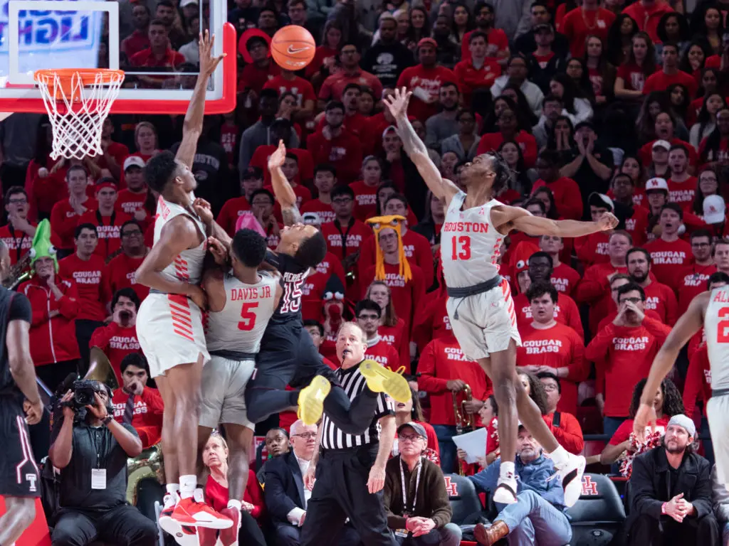 DeJon Jarreau (No. 13) gives the University of Houston extreme length and the Cougars sell out on defense. (Photo by F. Carter Smith.)