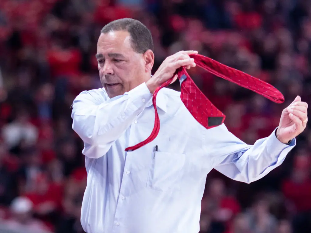 University of Houston coach Kelvin Sampson would throw his suit jacket and tie off during games for years. (Photo by F. Carter Smith.)