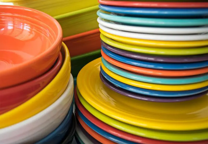 Rainbow-colored, timeless Fiestaware plates are still manufactured in Newell, West Virginia.