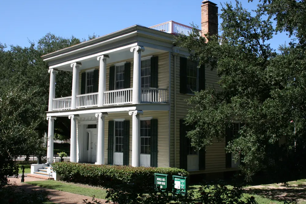 The Greek Revival Nichols-Cherry-Rice House was built in 1850 and was home to William Marsh Rice and later Emma Richardson Cherry. 