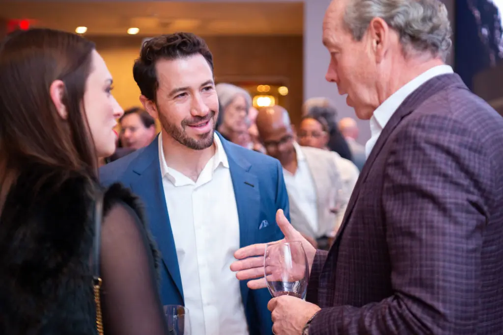 Guests of Houston Astros owner Jim Crane enjoy a preview of Balthezar Cellars, his newest project with winemaker Jesse Katz. (Photo by Michelle Watson/CatchlightGroup.com)