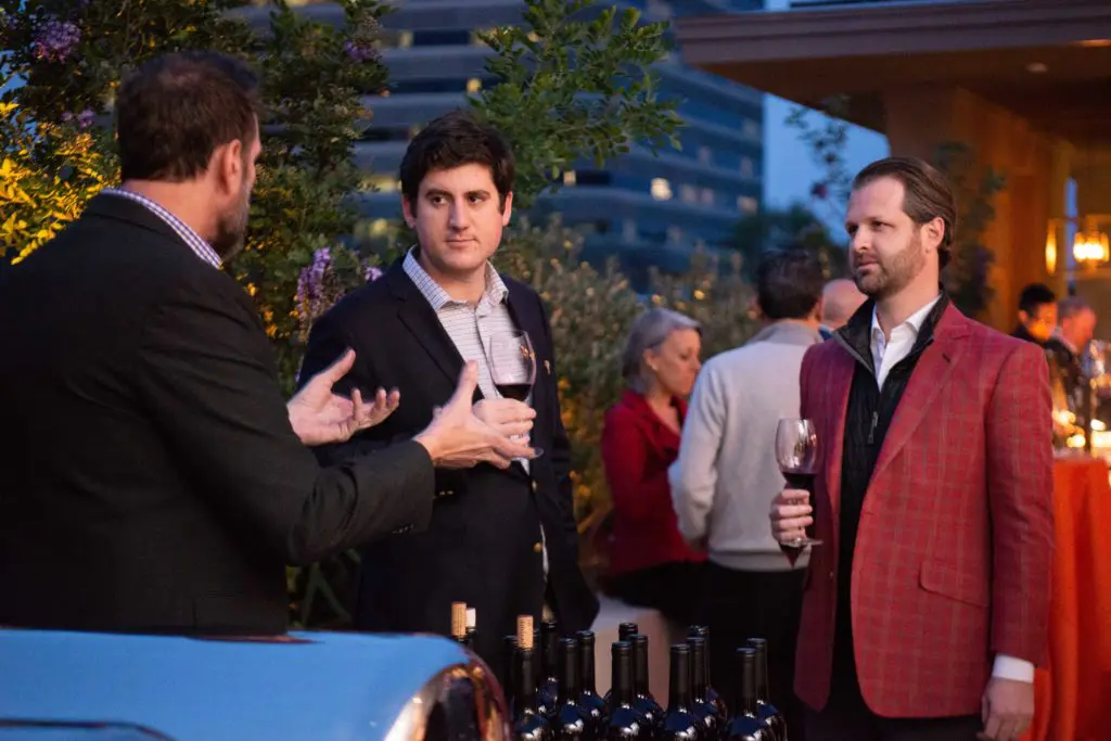 Guests of Houston Astros owner Jim Crane enjoy a preview of Balthezar Cellars, his newest project with winemaker Jesse Katz. (Photo by Michelle Watson/CatchlightGroup.com)