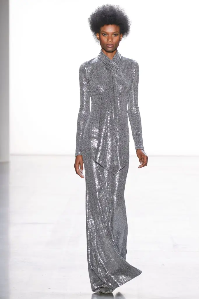 Badgley Mischka silver sequined long-sleeve gown with tie detail (Photo by Badgley Mischka)