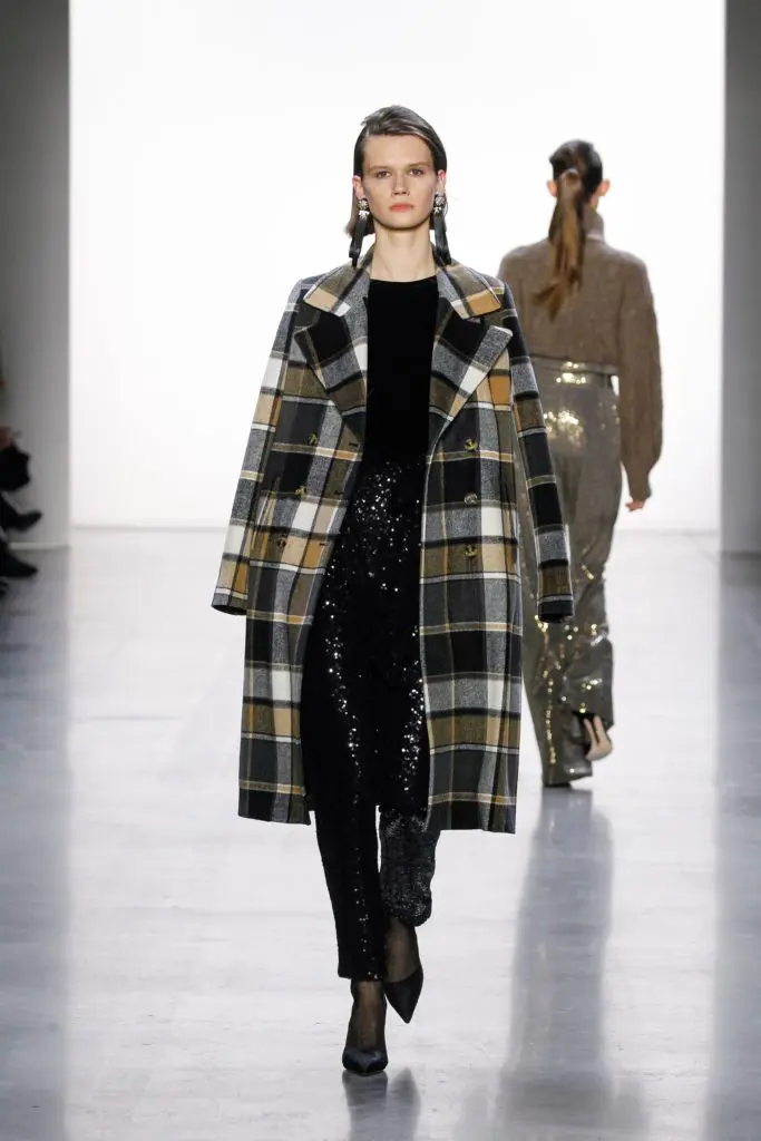Badgley Mischka plaid coat, sequined trousers, black top (Photo by Badgley Mischka)