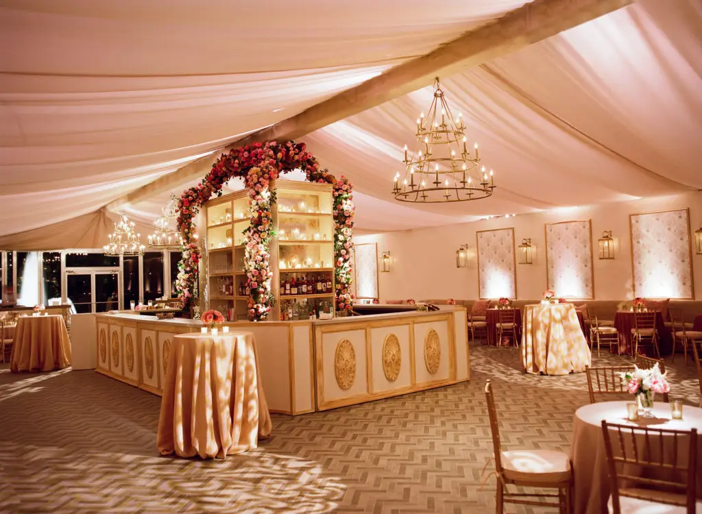 A view from the stunning reception tent with custom herringbone wood floors (Photo by Liz Banfield)
