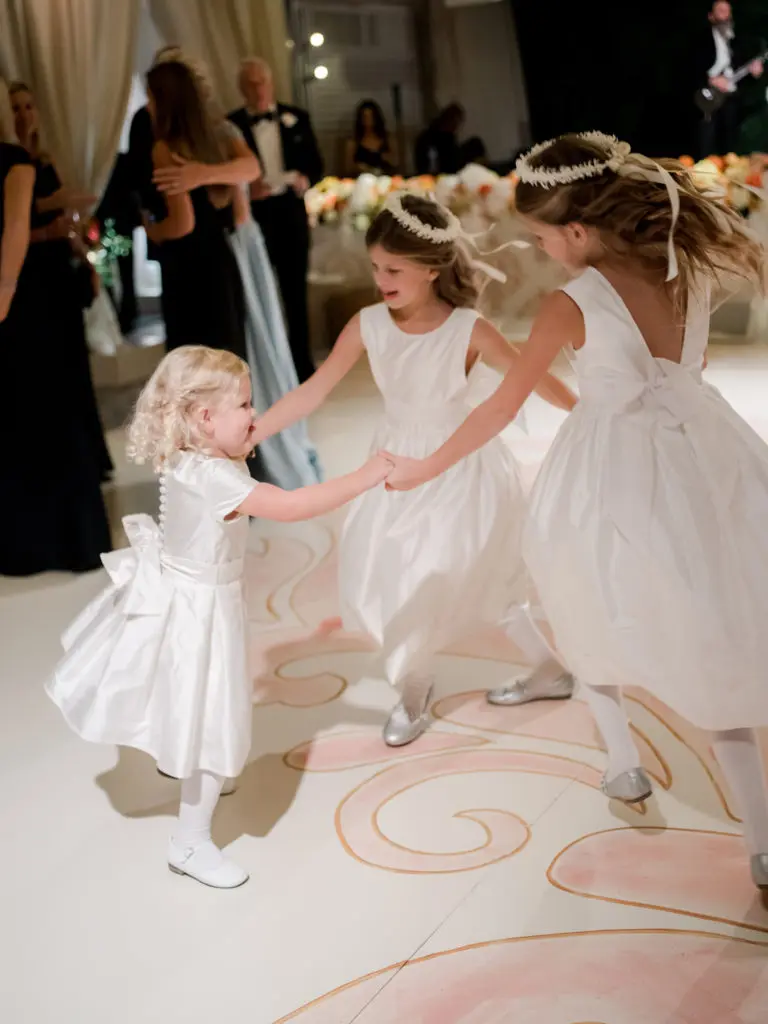Flower girls showing off their moves on the hand painted dance floor (Photo by Liz Banfield)